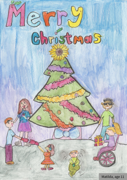 Children with additional needs stood around a Christmas tree